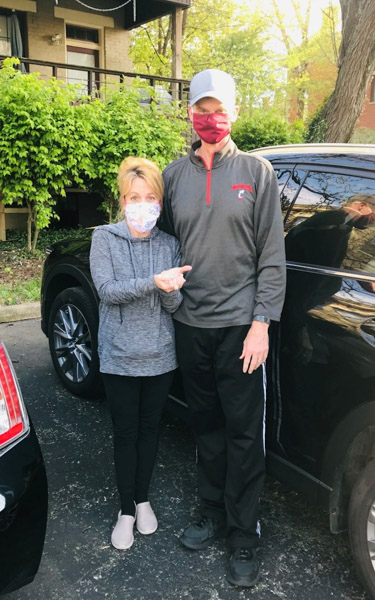 Ken Schlachter and wife in masks - COVID-19